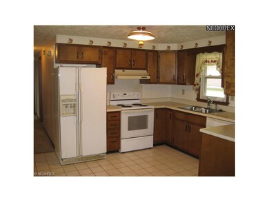 A generous supply of cabinetry as well as all appl
