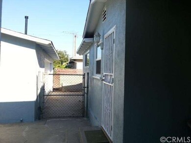 VIEW OF BREEZEWAY BETWEEN HOUSE AND GARAGE