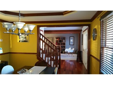 Dining Room Flowing to Foyer and Living Room