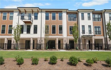 Homesite 33 features a fenced front courtyard and terrace level entry.