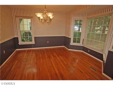 Dining Room - Formal dining room with wood floor, 