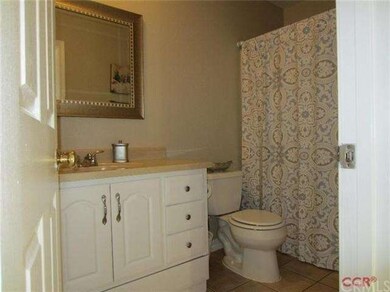 Guest bathroom with updated vanity, low flow toile
