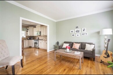 Gleaming hardwoods and easy flow from room to room.