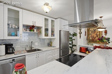 Kitchen featuring appliances with stainless steel 