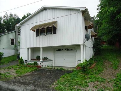 Exterior Front. ONE CAR GARAGE