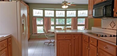 Eat-in kitchen with double sink, Merillat cabinets