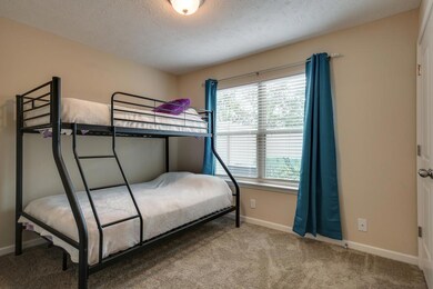 GUEST BEDROOM OR OFFICE ON THE MAIN LEVEL RIGHT OFF THE KITCHEN!