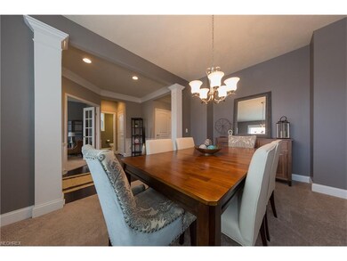 The formal dining room welcomes a cozy dinner for 