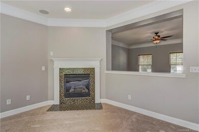 Gorgeous gas fireplace with mantel.