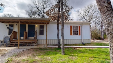 View of front of property featuring a front lawn