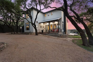 View of front facade featuring covered porch, fen