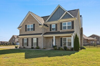 Notice how the painted board and batten accentuates the brick!