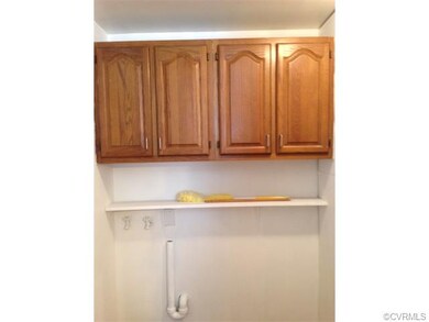 This utility room is located off kitchen with nice