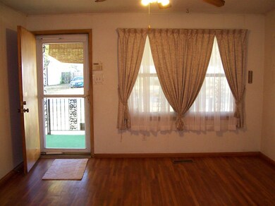 12.5x13.5 living room with wood floor and picture 