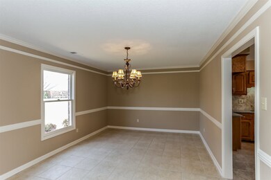 The elegant Dining Room is perfect for hosting par