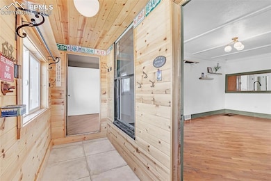 Hall off the main entry leading to main bedroom an