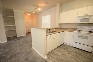 9401 Crescent Loop Cir unit 103, Tampa, FL 33619 - photo 3