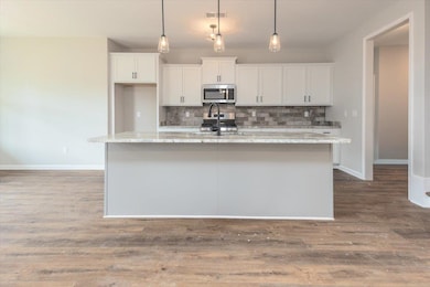 Kitchen featuring stainless steel appliances, a ki