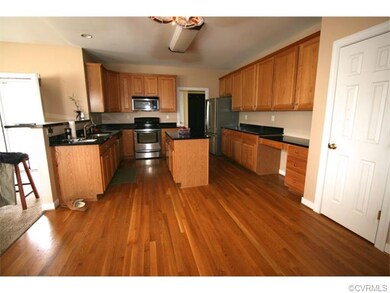 Spacious Kitchen with Granite and stainless applia