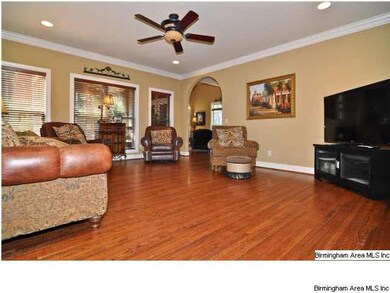 The great room right off the kitchen and close to 