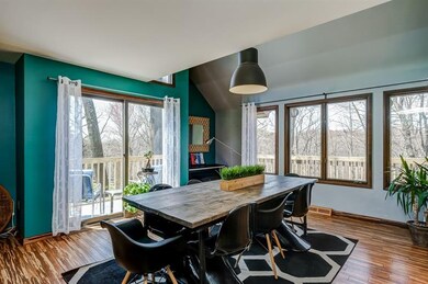 The spacious, light-filled dining room is accessed