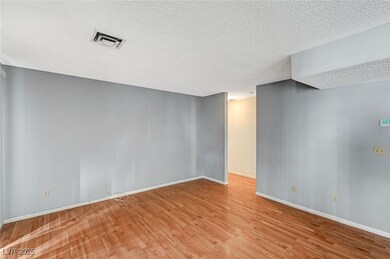 Unfurnished room with light wood-type flooring, vi