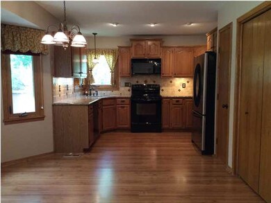 granite counters...tumbled stone backsplash...unde