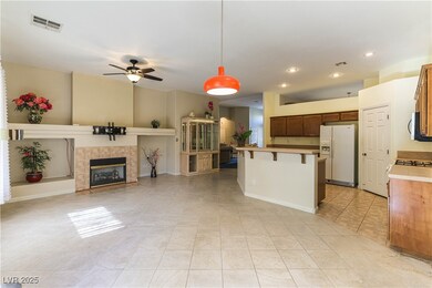 Kitchen and family room with fireplace, with stain