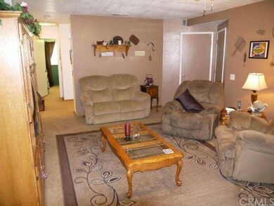 View of the hallway from other side of living room