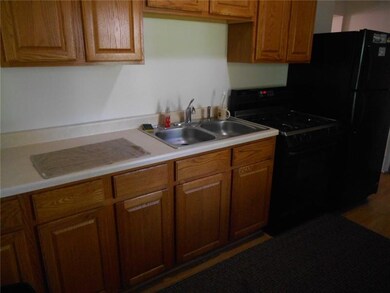Kitchen with appliances included.