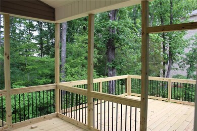 Covered Screened in Deck with Attached BBQ Deck