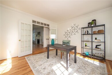 What was originally the Living Room has been re-created as a private Home Office.