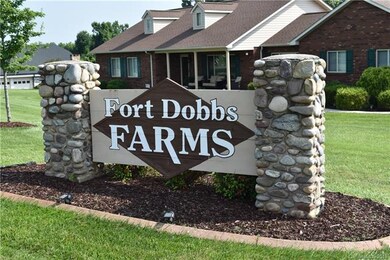 THE FORT DOBBS FARMS SIGN IS LOCATED ON THE PROPER