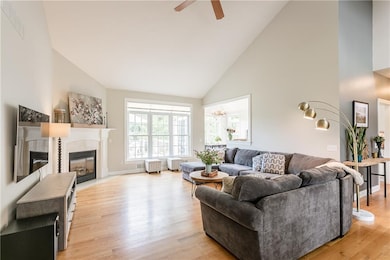 Living Room with view of back yard and woods