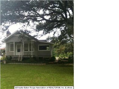 Front of house with new paint colors.