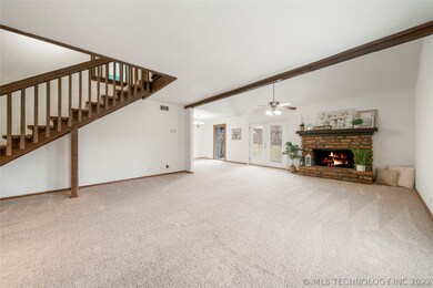 Living room is oversized and connects to formal di