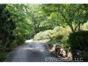 Driveway w/ Lovely Stone Wall