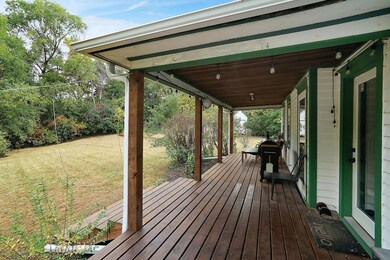 New porch replaced in 2020 with large open deck.