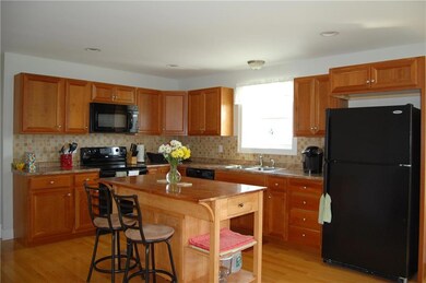 Spacious & sun-filled kitchen.