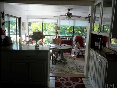 Kitchen flows right into the Florida Room