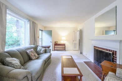Large great room with wood-burning fireplace and l
