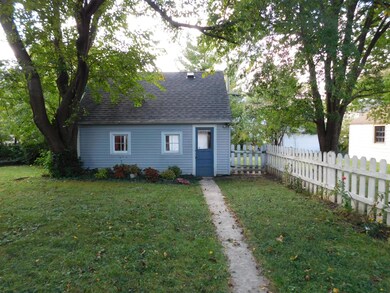 Garage at the end of a large back yard