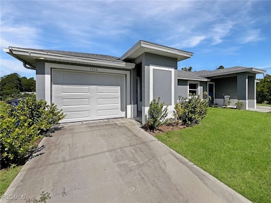 1306 W 12th St, Lehigh Acres, FL 33972 - photo 3