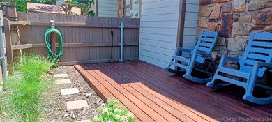 Great redwood stained deck inside patio