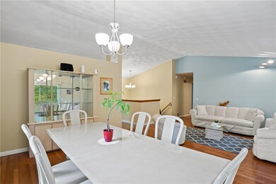 Dining area and living room, very bright and open.