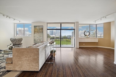 Spacious, modern living room with hardwood floors