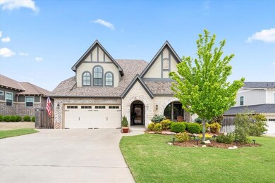 View of front of home featuring a garage and a fro