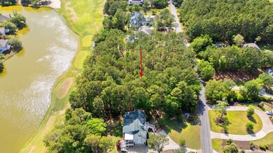 Aerial view featuring a residential view, view of golf course, and a water view
