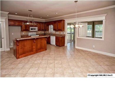 Spacious kitchen with bar top island