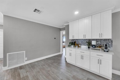 Additional bar area offered in living room with to